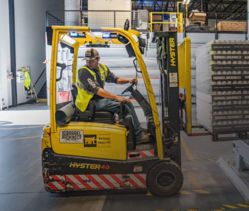 worker operating machinery